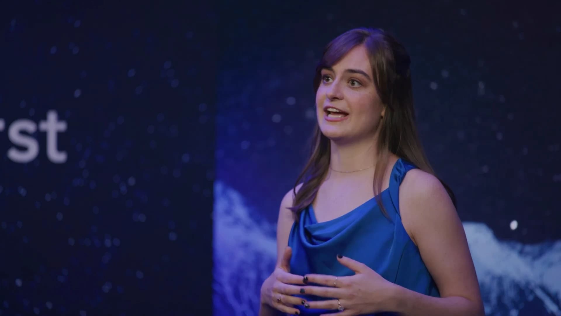 A Starburst presenter speaking on stage at Launch Point